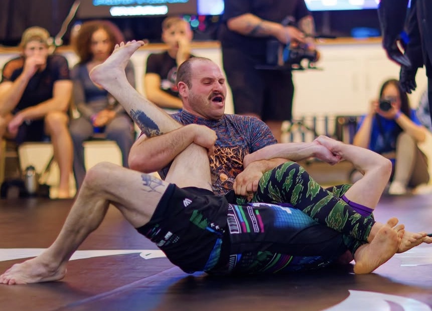 Avi Cohn locking up a honeyhole leg entanglement during a seminar